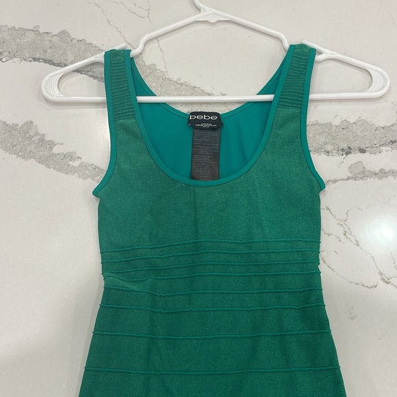 Emerald green Bebe dress size small. Cut out in the back - Picture 4 of 4